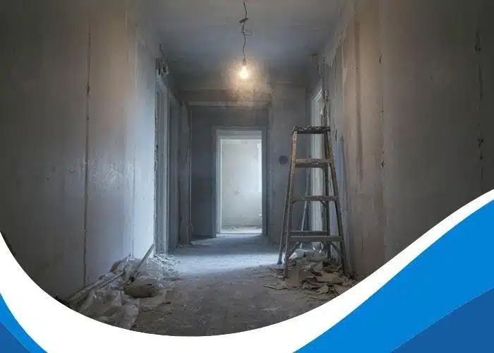 Aspiration de la poussière fine et ramassage de résidus lors de travaux dans un appartement
